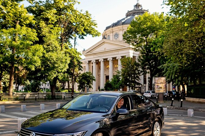4h Bucharest Panoramic Tour by Car with stops - Piaka Revolukiei and Palatul CEC: revolution energy and everyday institutions