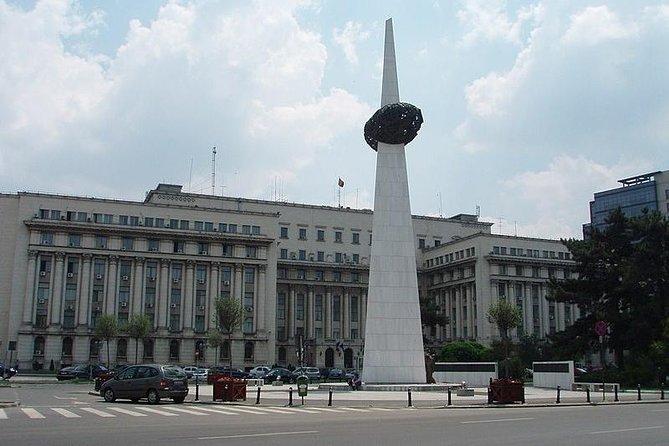 Bucharest Highlights Bike Tour - Calea Victoriei and Ceaușcu’s last speech at Piata Revolutiei