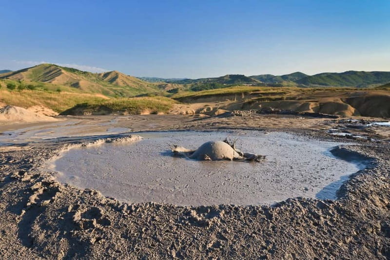 Bucharest: Muddy Volcanoes and Salt Mine Private Day Tour - The Berca Mud Volcanoes: cold eruptions, bubble gas, and lunar-cone views