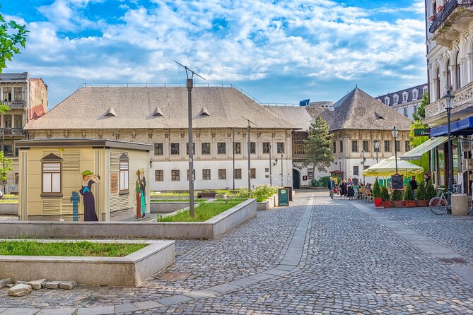 Bucharest one day tour with Parliament Palace and Village Museum - Revolution Square Monument: What You’re Standing In Front of