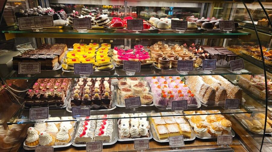 Bucharest: Sweet Delights History and Desserts Walking Tour - Old Town Legends and the Papanasi Finale at City Grill Covaci