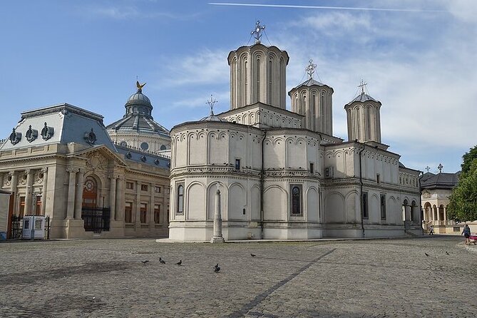 Highlights of Bucharest 4h private Tour - Triumph Arch and Piata Revoluției: monuments with a timeline behind them